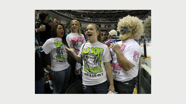 Jeff Stanley, far right, chat with other Sharks fans during warm-ups before the San Jose Sharks game against the Vancouver Canucks with his two daughters Chandler, 12, second from right, and Cameron, 19, second from left, and their friend Amanda Mosher, 19, far left, for Game 4 of the Western Conference Finals at HP Pavilion in San Jose, Calif. on Sunday, May 22, 2011. (Nhat V. Meyer/Mercury News)